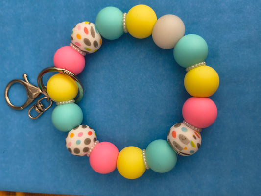 Pastel Yellow Pink Blue and Poka Dots Wristlet